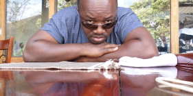 You may know it as Liberian English.  Its official name is Kolokwa